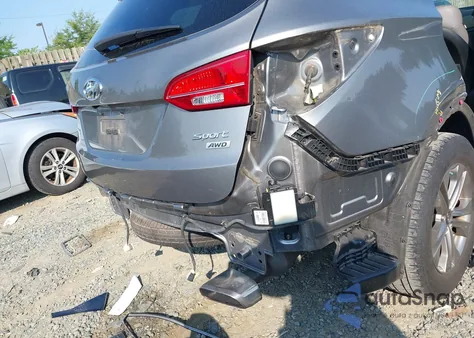 2016 Hyundai Santa Fe Sport 2.4L from USA, damaged, VIN 5XYZUDLB8GG340615